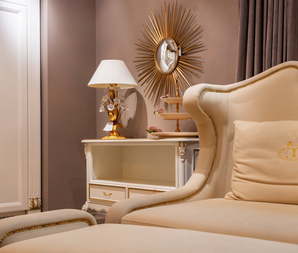 Cozy classic room with elegant decor featuring beige furniture and gold accents, creating a warm and inviting atmosphere.